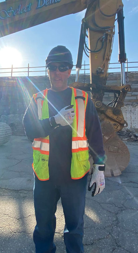 Construction worker wearing Tuff Hands™ Safety Pro Gray Gloves