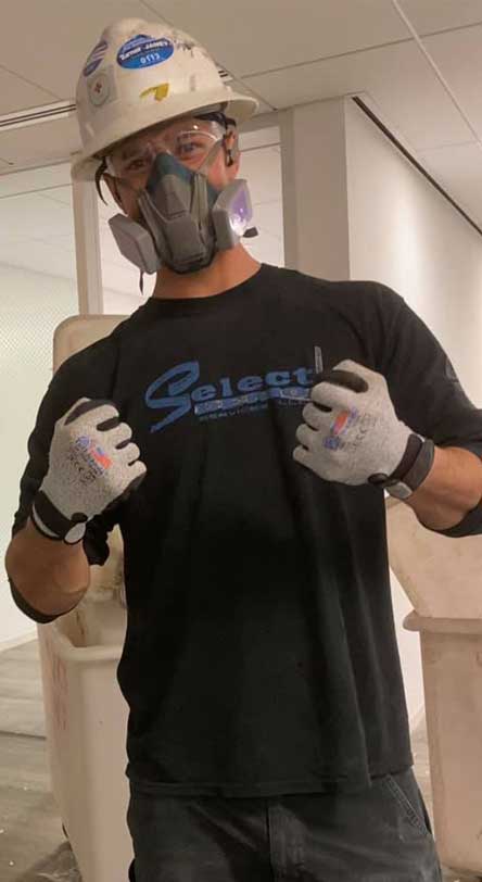 Construction worker wearing Tuff Hands™ Safety Pro Gray Gloves