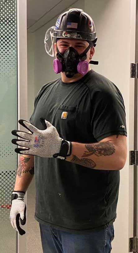 Construction worker wearing Tuff Hands™ Safety Pro Gray Gloves