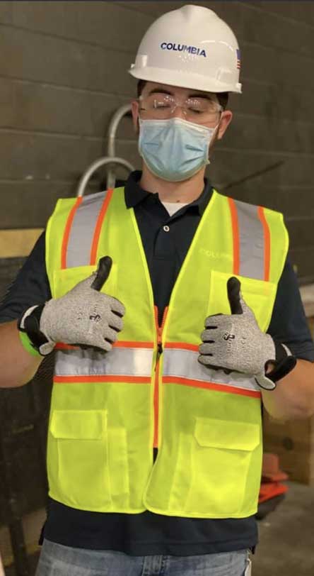Construction worker wearing Tuff Hands™ Safety Pro Gray Gloves